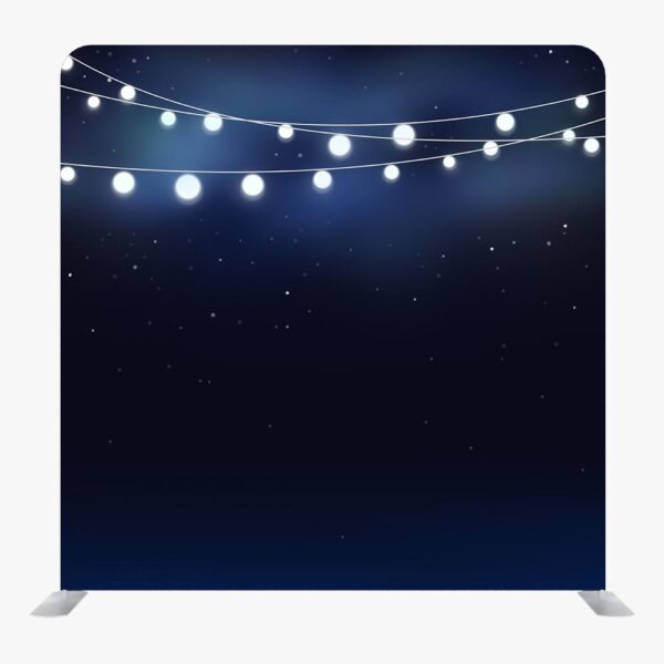 An image of a framed tension fabric photobooth backdrop with stars and string lights available from ATA Photobooths.