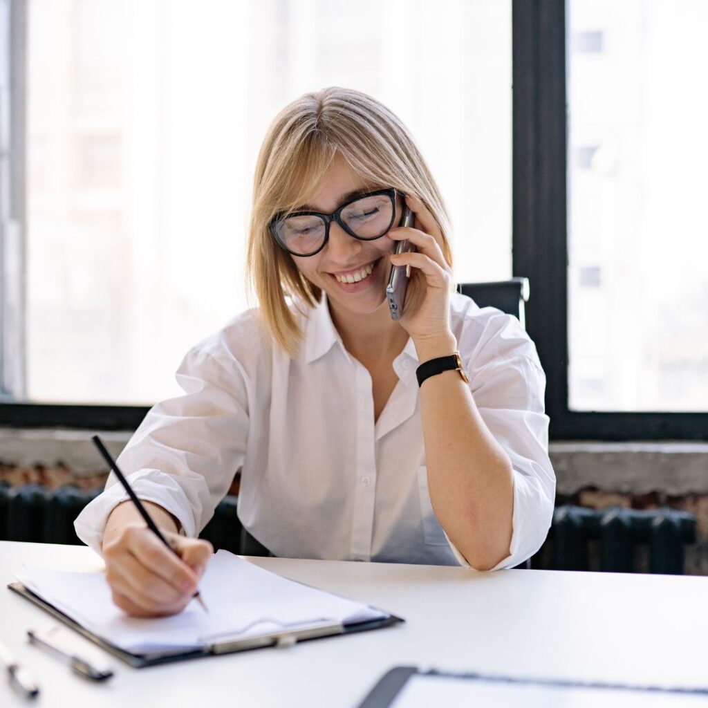 Woman on the phone smiling